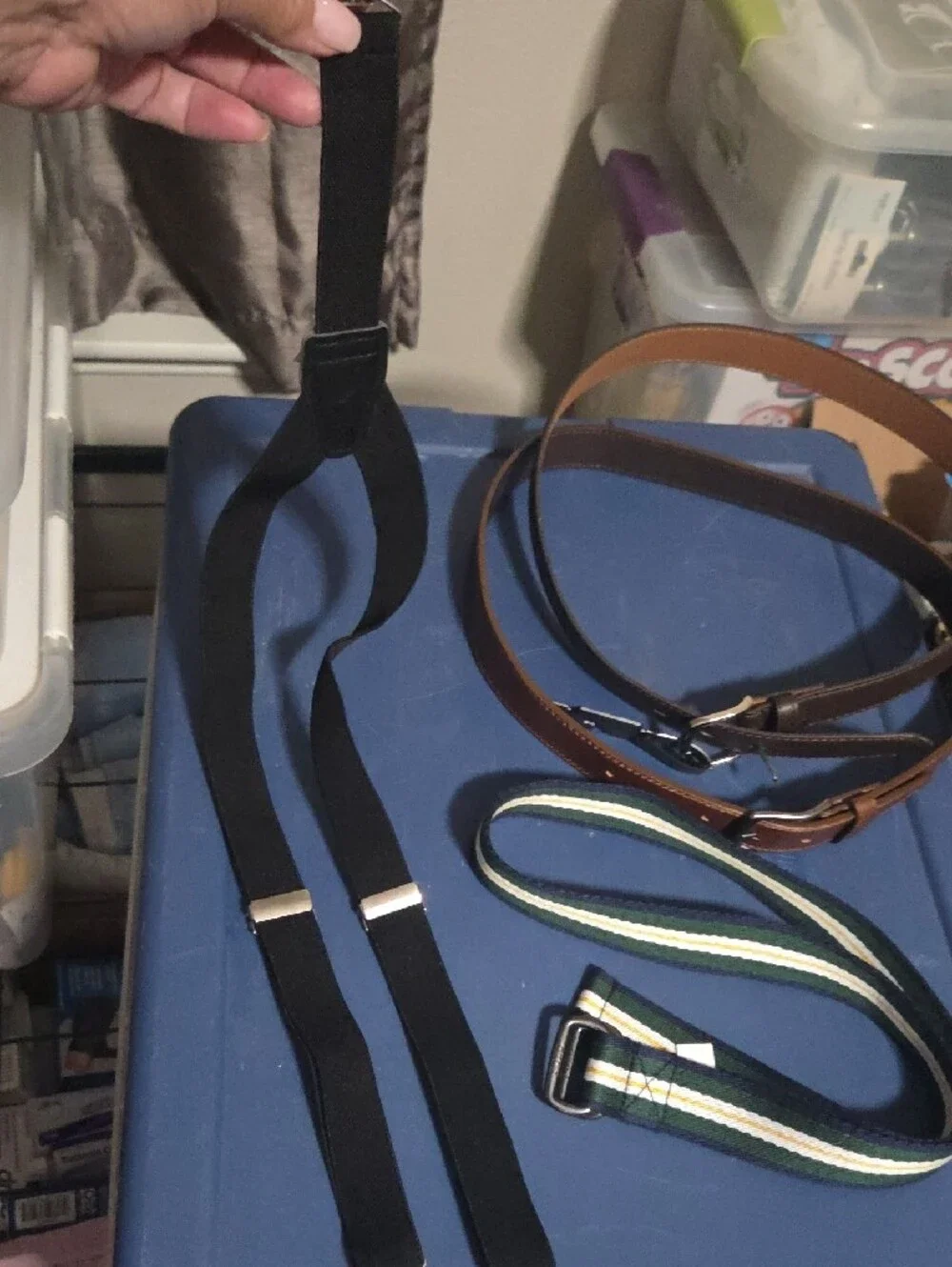 3 Belts.  2 Brown Boys Belts, A Canvas Polo Belt And Black Suspenders.